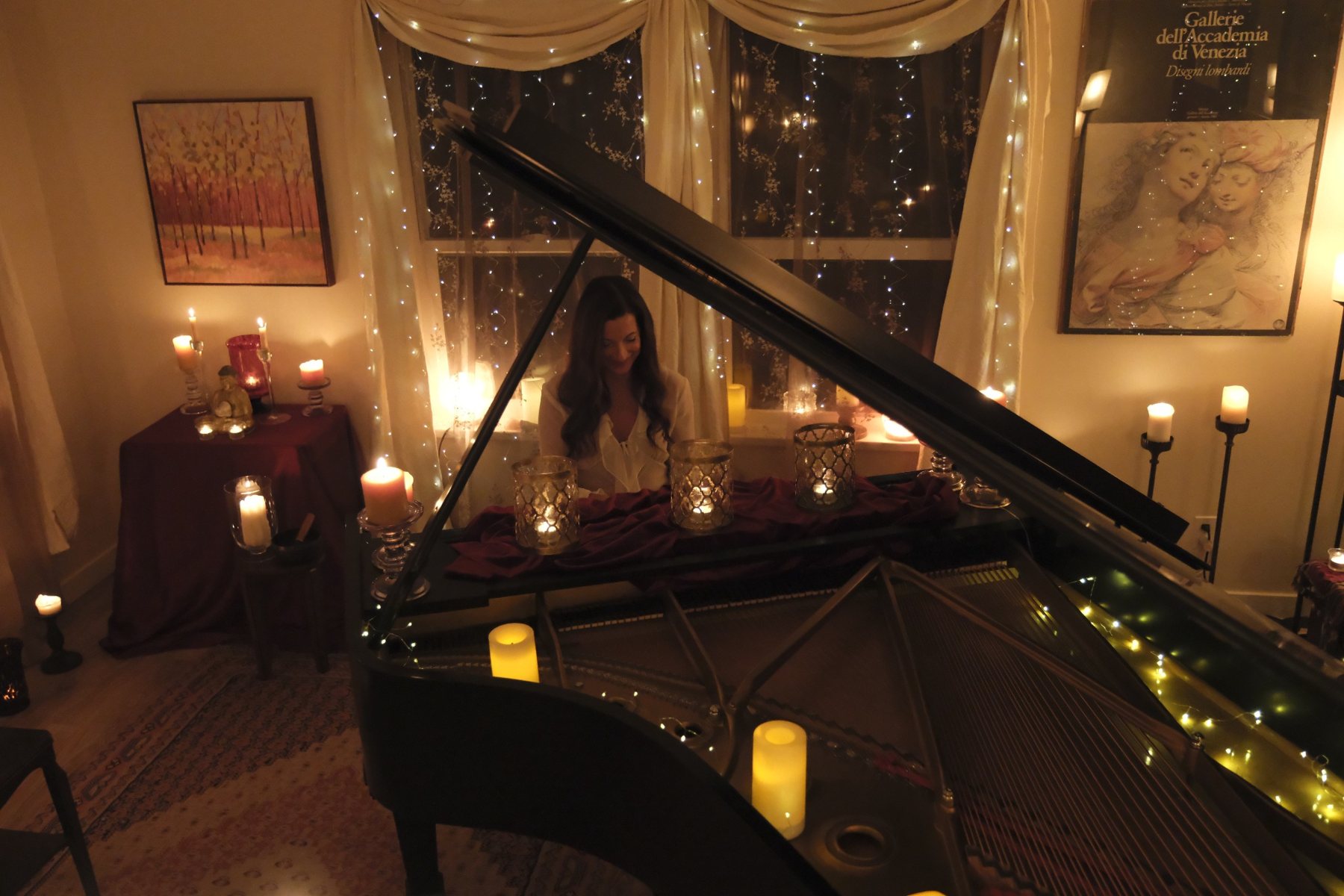 The candlelit RESONANCE studio prepared around Lori-Ann Speed's grand piano
